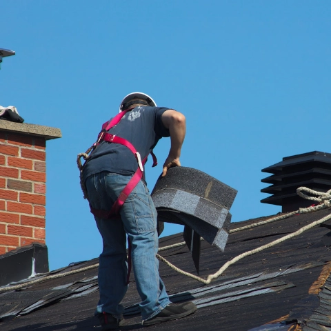 Roofer working on a roof.
